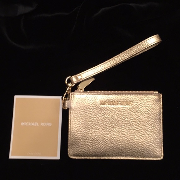 Michael Kors Handbags - Michael Kors new with box gold metallic wristlet